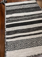 Handmade Black & Ivory Geometric Cotton Rug – 2’ × 3’
