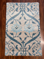 Handmade Blue & Ivory Floral Wool Rug – 2’ × 3’