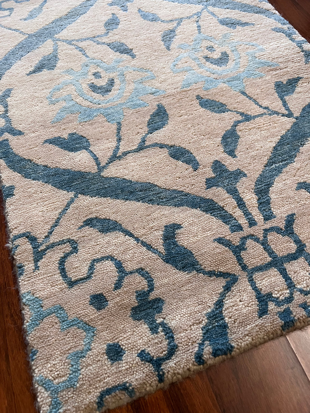 Handmade Blue & Ivory Floral Wool Rug – 2’ × 3’