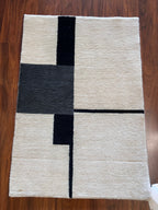 Handmade White & Navy Geometric Wool Accent Rug – 2’ × 3’