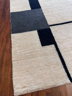 Handmade White & Navy Geometric Wool Accent Rug – 2’ × 3’