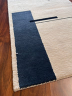 Handmade Ivory & Navy Wool Accent Rug with Abstract Lines – 2’ × 3’